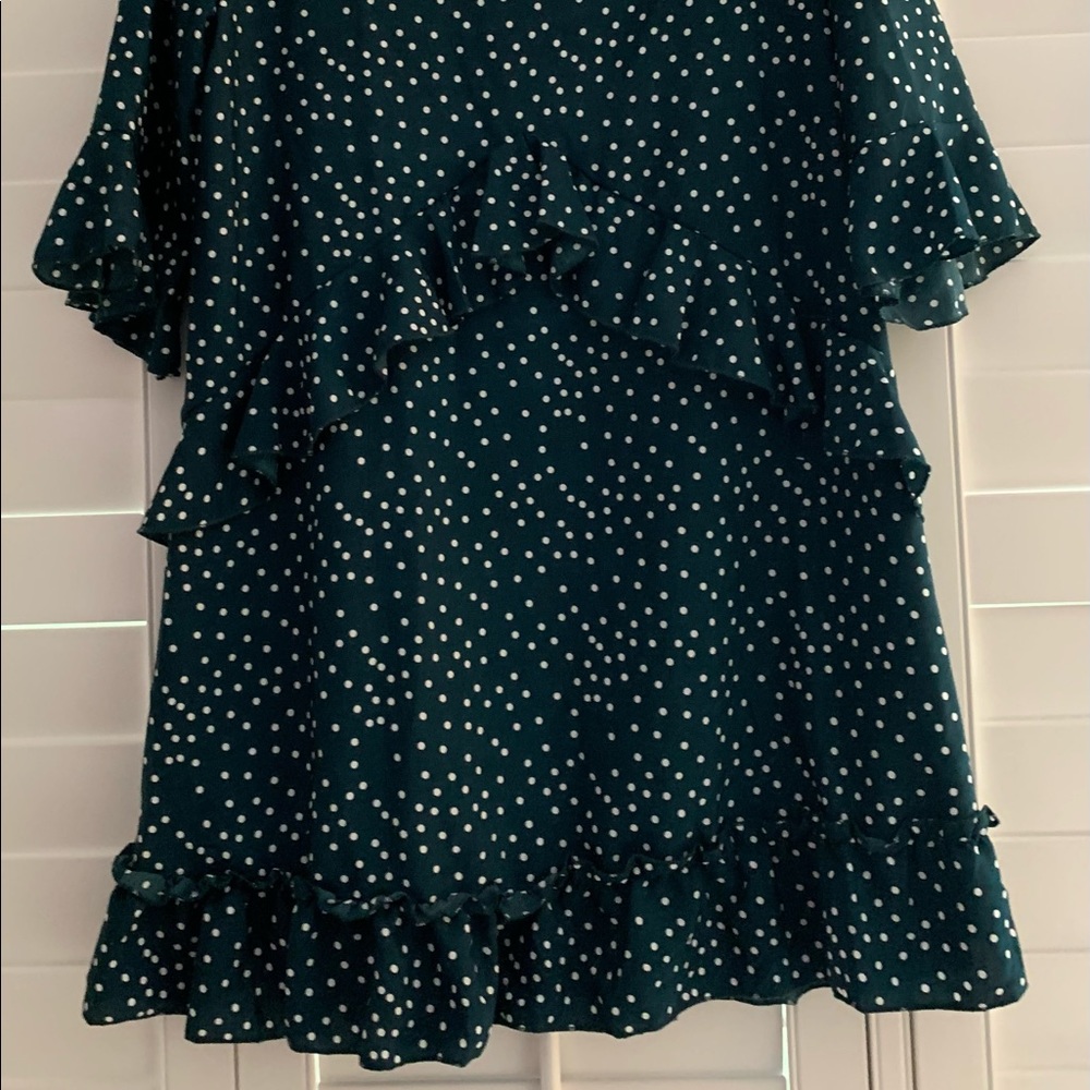 Dark green-blue and white polka dot dress with ruffles and 3/4 sleeves. L